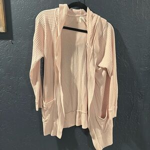 Soft pink cardigan with pockets and hood